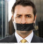 Businessman Gagged with Black Tape